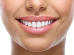 Attractive woman has appealing, plump lips after cosmetic treatments.