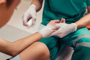 Burn victim treated by a doctor at the hospital.